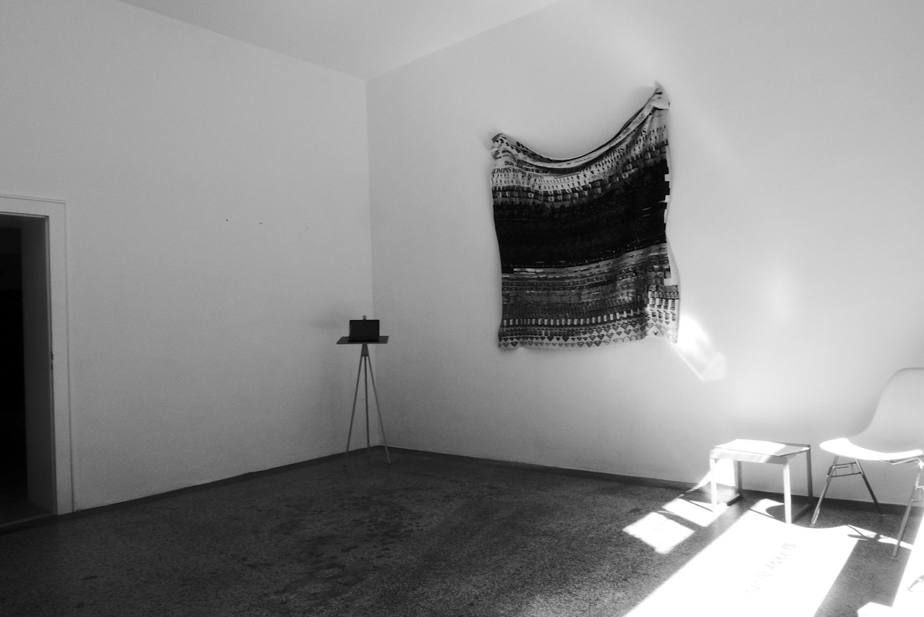 Digital-Soirée 1 — installation view: the woven Search by Image blanket on the wall, a laptop on an easel