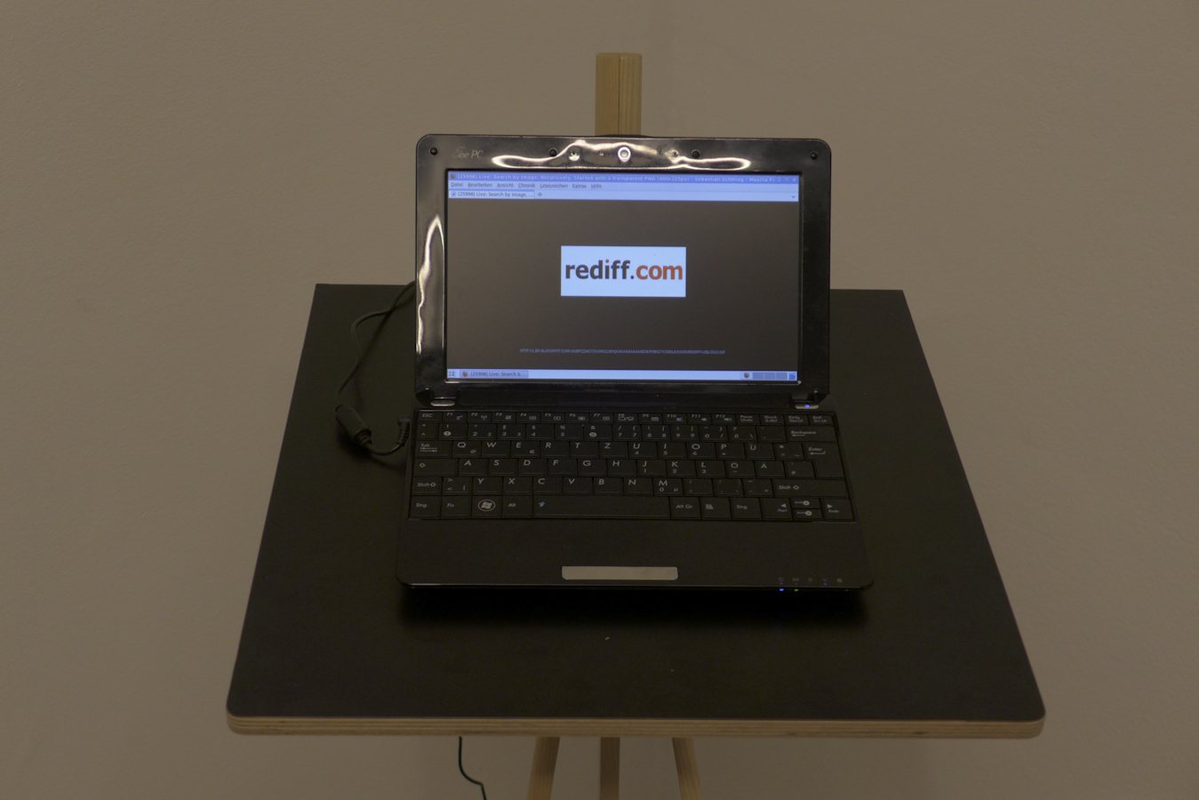 Digital-Soirée 1 — the Search by Image work running on a laptop, on a pedestal