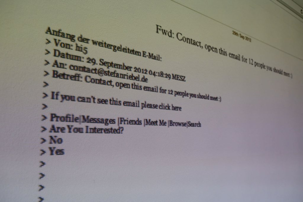 myspam — a forwarded spam email, printed out: 'open this email for 12 people you should met'